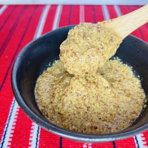 A generic square placeholder image with rounded corners in a figure.